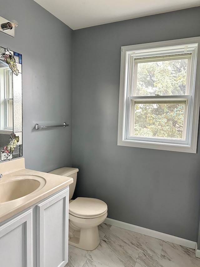 bathroom with vanity and toilet