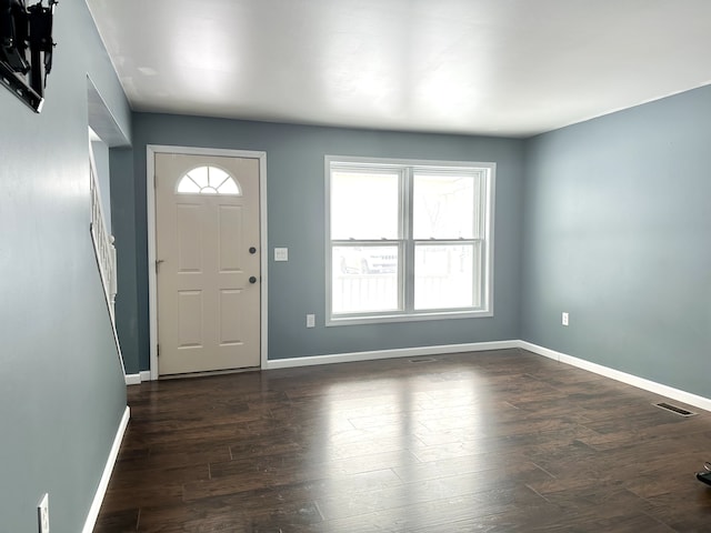 entryway featuring dark wood-type flooring