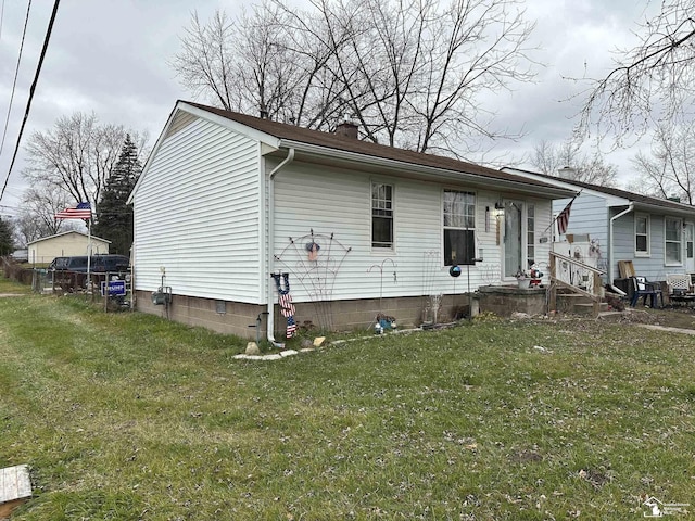 exterior space featuring a front yard