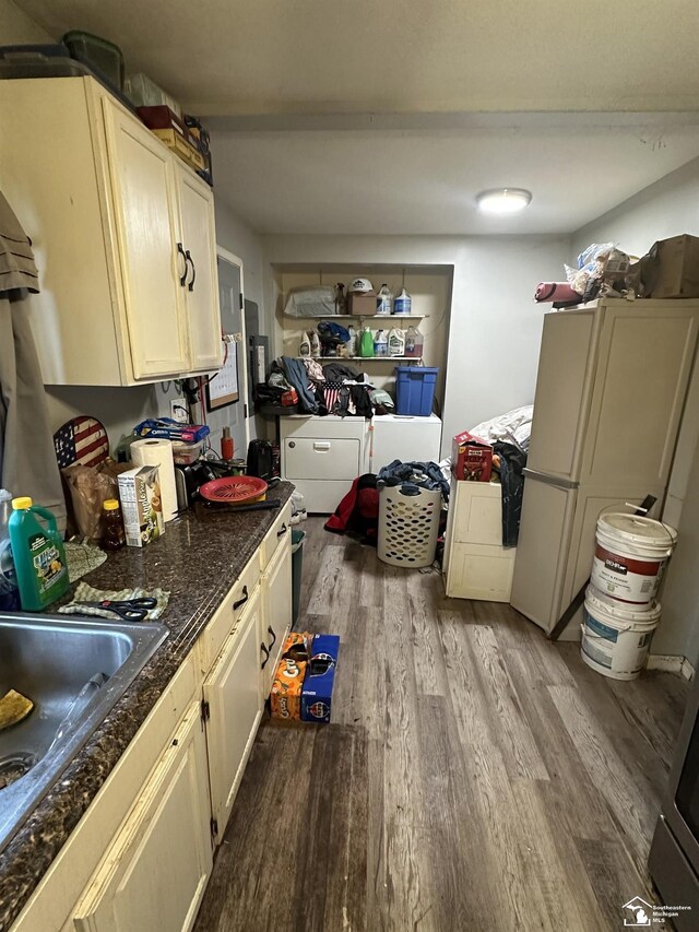 kitchen with sink and light hardwood / wood-style flooring