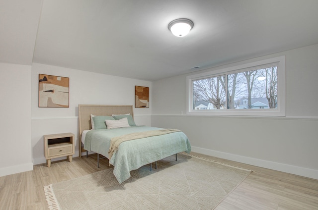 bedroom featuring wood-type flooring