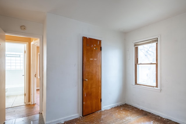 spare room featuring light hardwood / wood-style floors