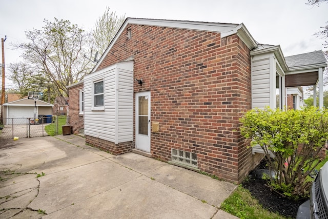 view of side of property with a patio area