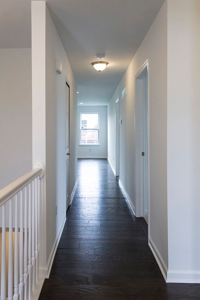 hall featuring dark hardwood / wood-style flooring