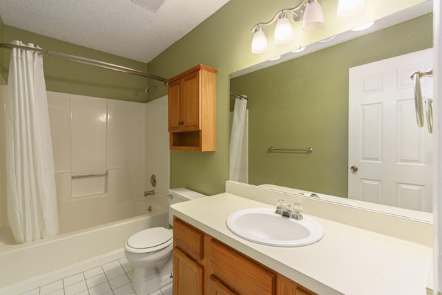 full bathroom featuring vanity, tile patterned floors, toilet, shower / bath combo with shower curtain, and a textured ceiling