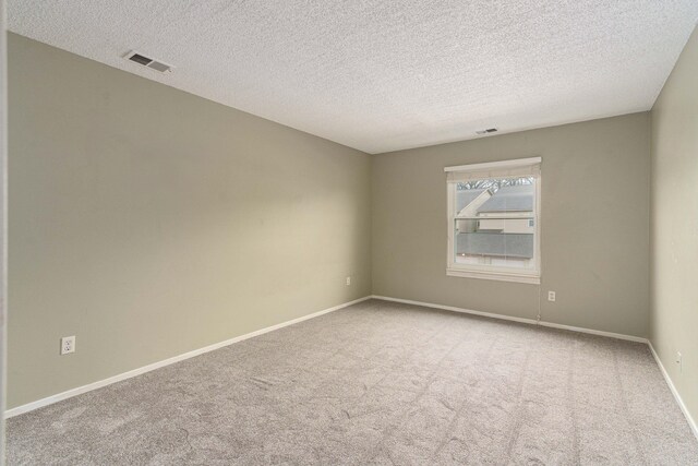 4980 Oak Hill Dr Unit 66, Waterford, MI 48329 - carpeted spare room with a textured ceiling