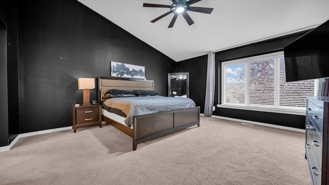 bedroom featuring light carpet, high vaulted ceiling, and ceiling fan