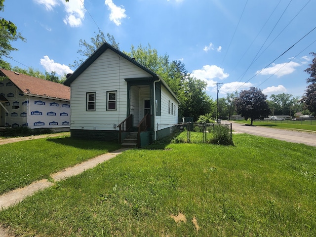 bungalow with a front lawn