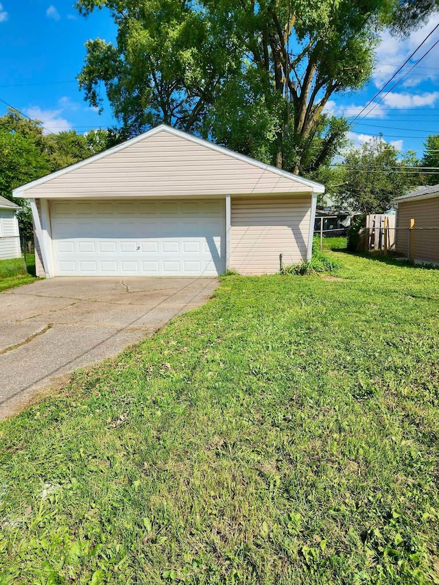 garage with a yard