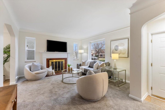 11059 Lakepointe St, Detroit, MI 48224 - carpeted living room with a fireplace and crown molding
