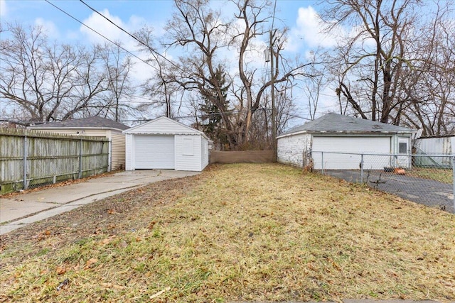 11059 Lakepointe St, Detroit, MI 48224 - view of yard featuring an outdoor structure and a garage