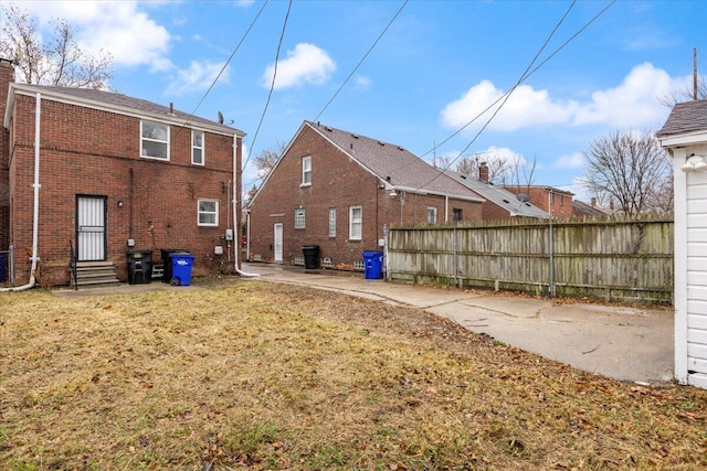 11059 Lakepointe St, Detroit, MI 48224 - rear view of property with a lawn