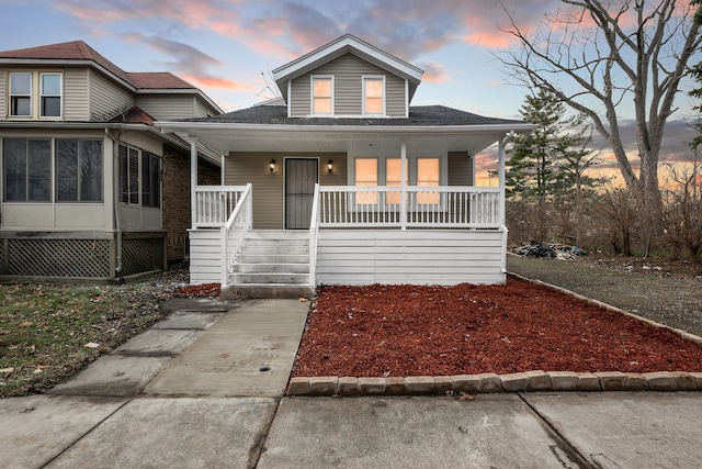 bungalow featuring covered porch