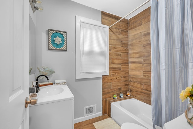 full bathroom with vanity, toilet, and shower / bathtub combination