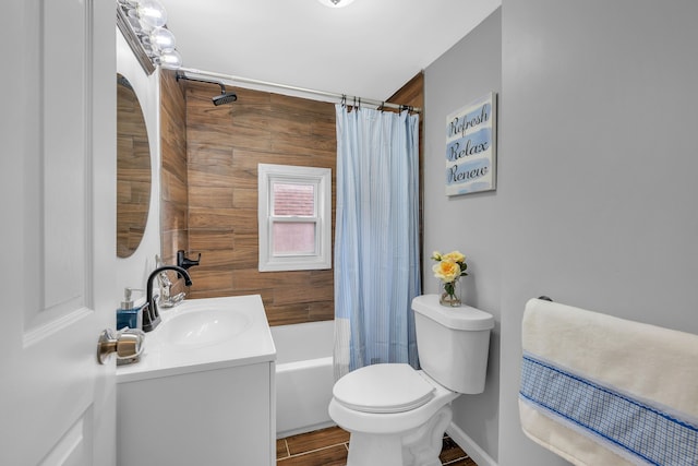 full bathroom featuring shower / bath combination with curtain, toilet, wood-type flooring, and vanity