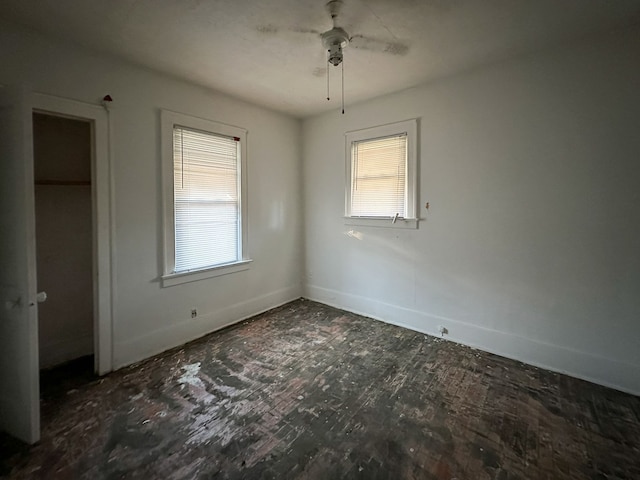 unfurnished room featuring ceiling fan