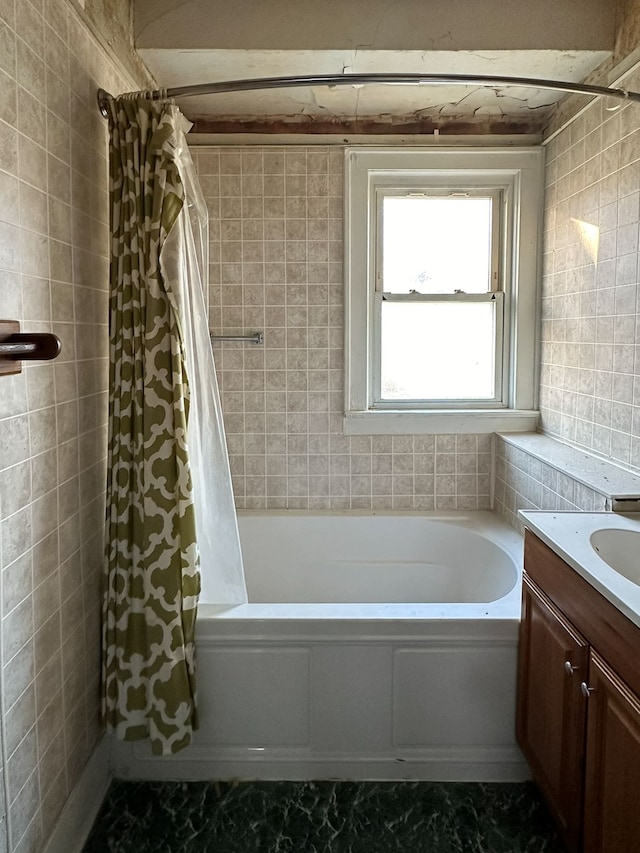 bathroom with shower / bath combo and vanity