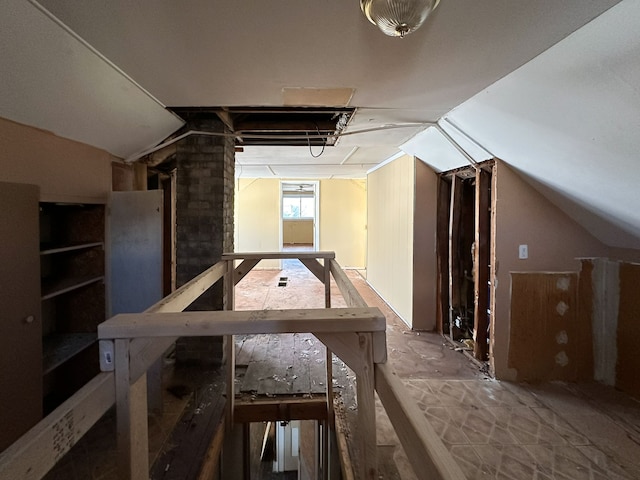 interior space featuring lofted ceiling