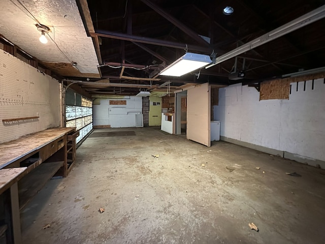 basement with a workshop area