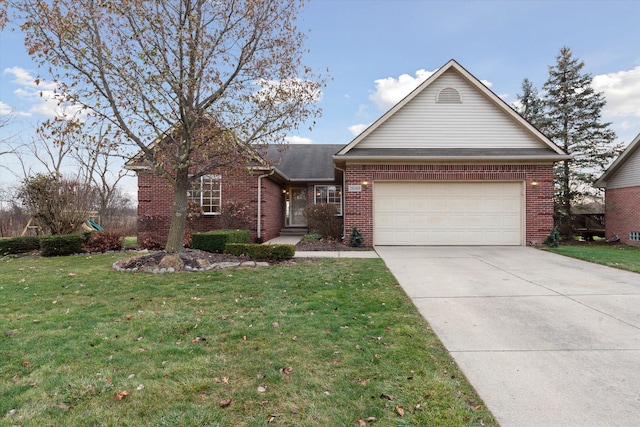 view of front facade featuring a front yard and a garage