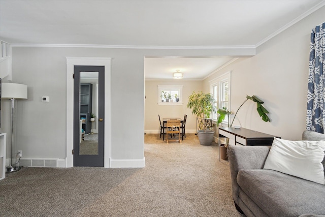 living room with crown molding and carpet