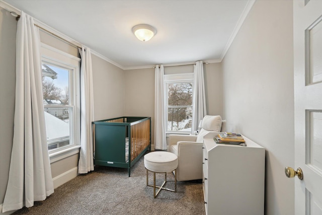 carpeted bedroom featuring ornamental molding and multiple windows