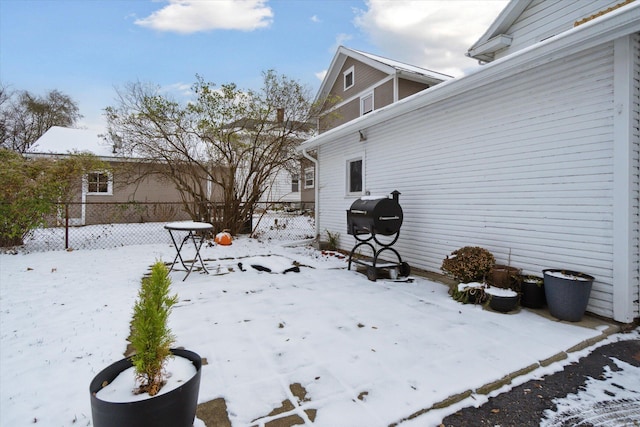 view of yard covered in snow