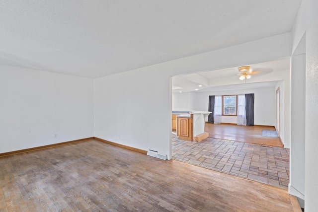 6058 Meadowwood Ln, Grand Blanc, MI 48439 - unfurnished room with ceiling fan and light hardwood / wood-style floors