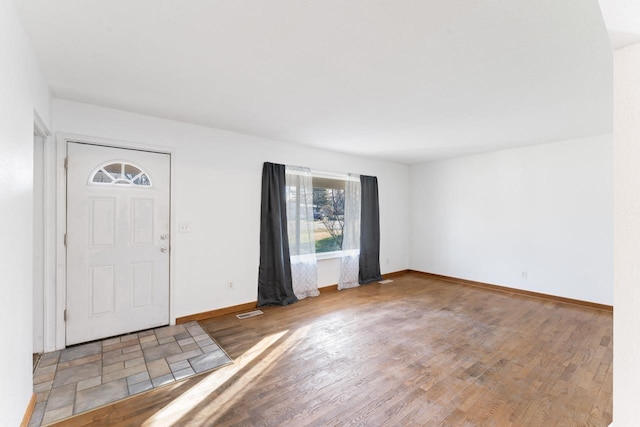 6058 Meadowwood Ln, Grand Blanc, MI 48439 - entryway with light hardwood / wood-style flooring
