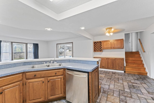 6058 Meadowwood Ln, Grand Blanc, MI 48439 - kitchen featuring a textured ceiling, stainless steel dishwasher, a wealth of natural light, and sink