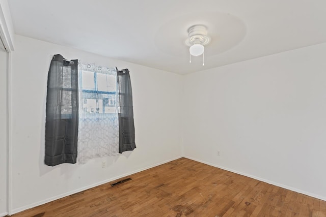 6058 Meadowwood Ln, Grand Blanc, MI 48439 - unfurnished room featuring hardwood / wood-style flooring