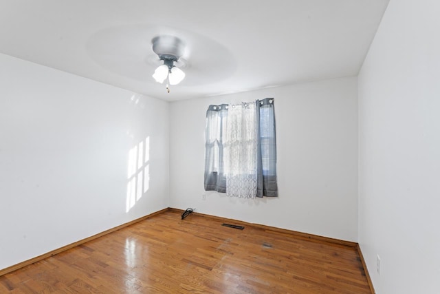 6058 Meadowwood Ln, Grand Blanc, MI 48439 - empty room with hardwood / wood-style floors and ceiling fan