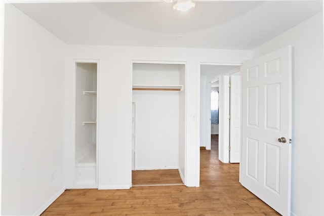 6058 Meadowwood Ln, Grand Blanc, MI 48439 - unfurnished bedroom with light hardwood / wood-style flooring