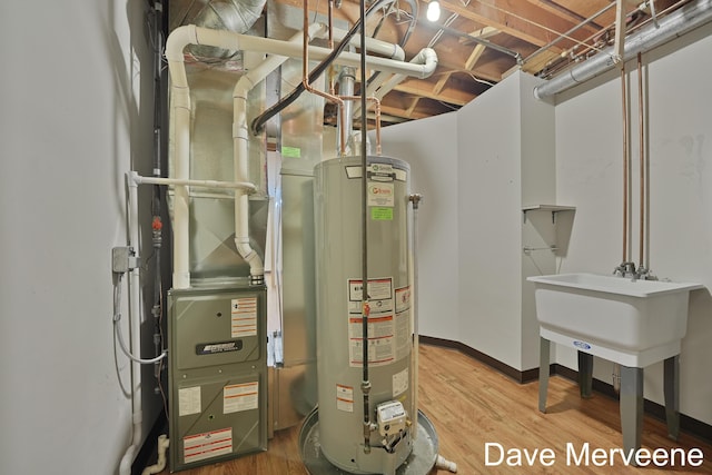 utility room with gas water heater