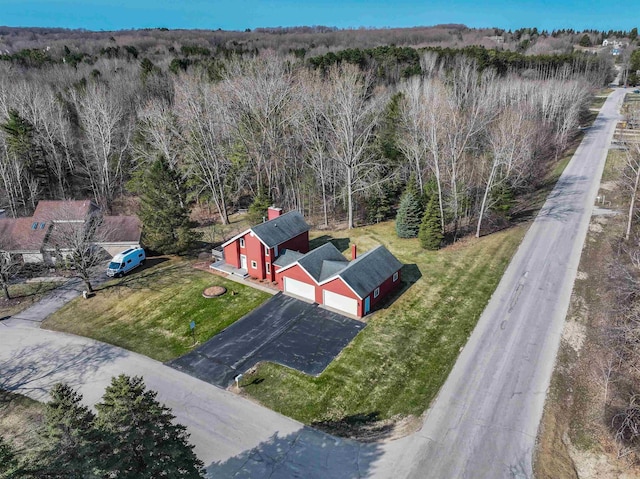 4243C Summerhill Rd, Traverse City, MI 49684 - view from above of property with a heavily wooded area