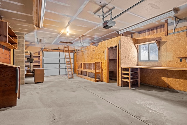 4243C Summerhill Rd, Traverse City, MI 49684 - garage featuring a garage door opener