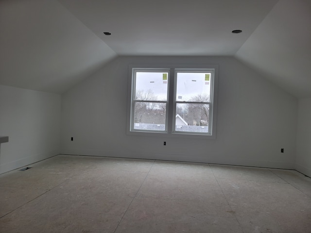 bonus room featuring vaulted ceiling