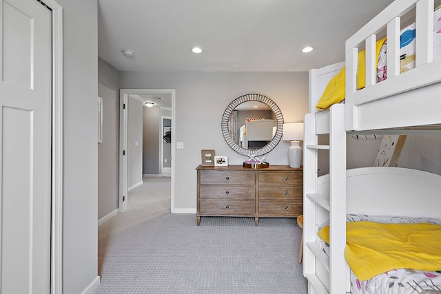 bedroom with light colored carpet