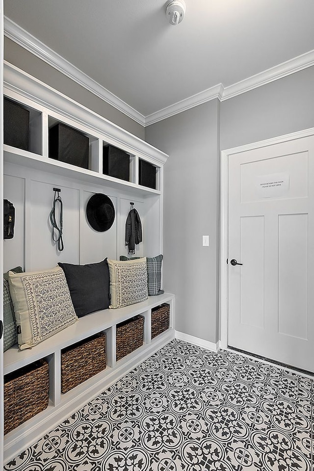 mudroom featuring ornamental molding