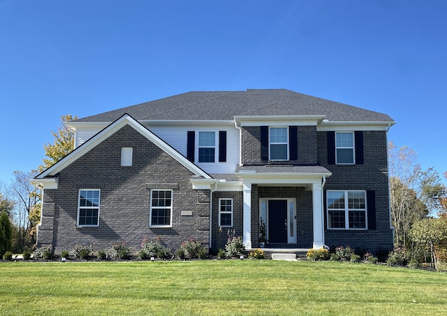 view of front facade with a front lawn