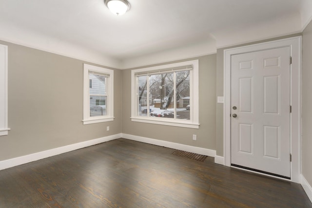 entrance foyer with dark hardwood / wood-style flooring