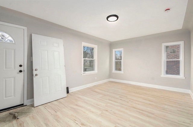 entrance foyer with light hardwood / wood-style floors