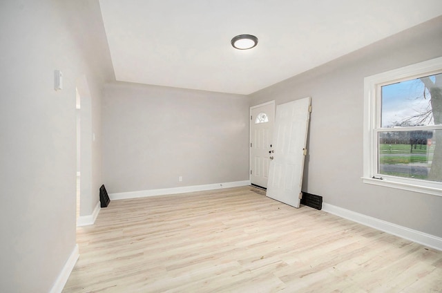 foyer with light hardwood / wood-style flooring