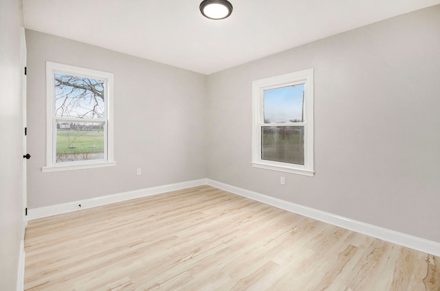 unfurnished room featuring light hardwood / wood-style flooring