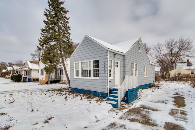 view of snow covered property