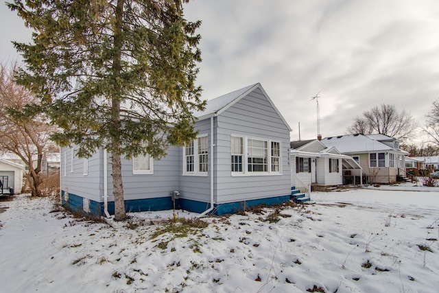 view of snow covered property