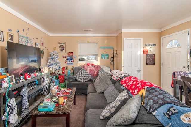 living room featuring ornamental molding and carpet floors