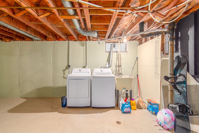 basement featuring washing machine and dryer