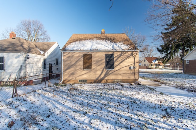 view of snow covered property