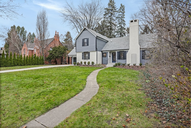 front facade with a front yard